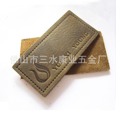 佛山市三水康業(yè)五金廠 專業(yè)提供中高檔熱壓絲印皮標(biāo)皮牌，助力服裝服飾品牌升級(jí)